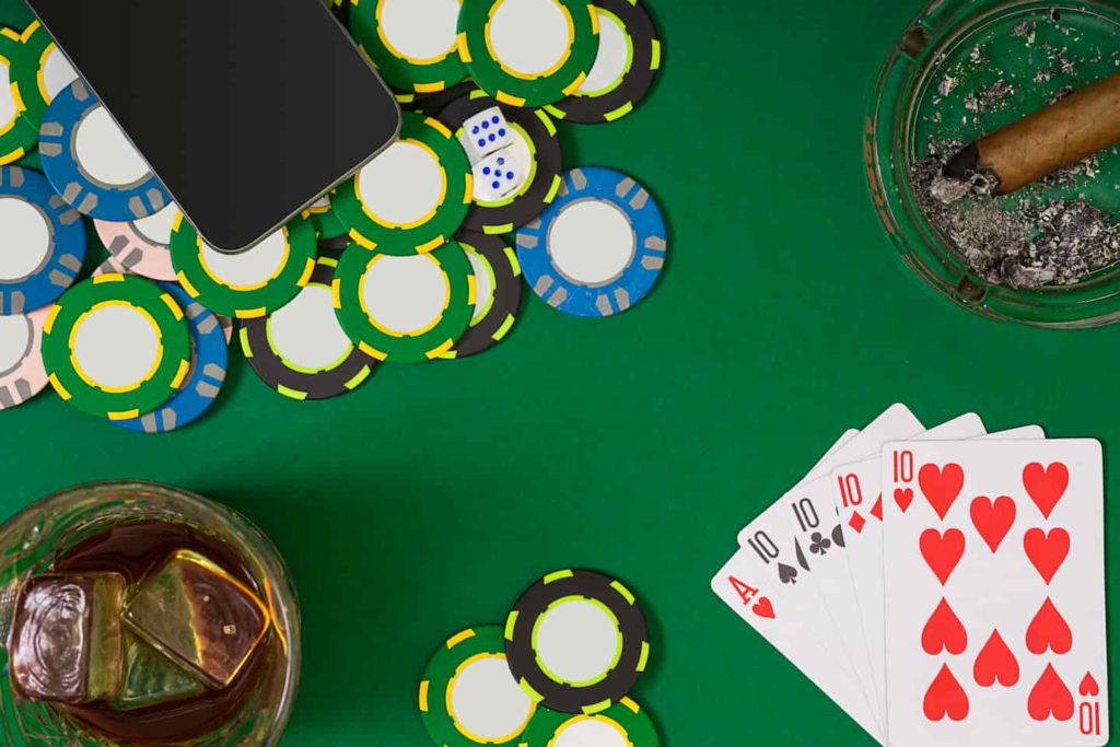 set-playing-poker-with-cards-chips-green-table-view-from-with-copy-space-banner-template-layout-mockup-online-casino-green-table-top-view-workplace (1)